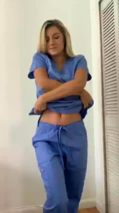 Sexy Nurse Stripping Off Her Uniform